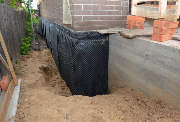 Happy homeowners after waterproofing job in Lakehurst